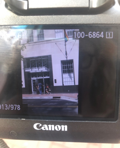 A poor quality photo of a poor quality photo on a canon camera of Ali Wong walking into her hotel